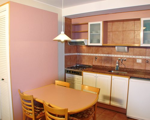An open plan kitchen and dining area.