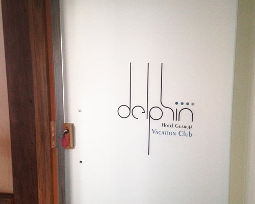 A view of the hotel name written in the door.