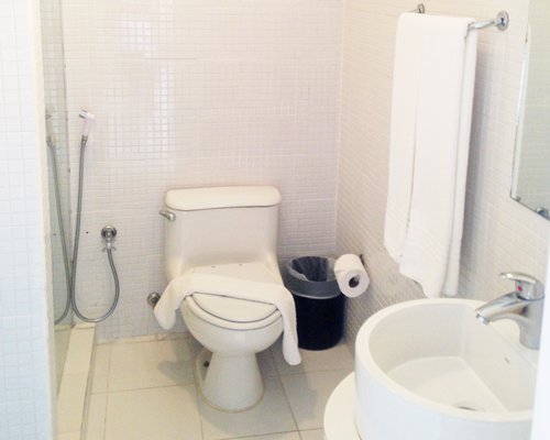 A bathroom with a single sink vanity.