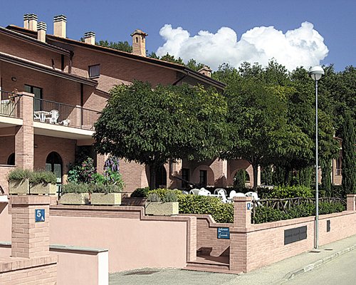 An exterior view of a multi story resort condo.