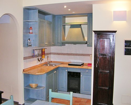 A well equipped kitchen with dining area.