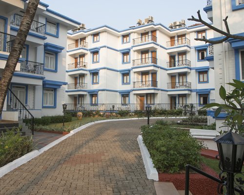 A scenic paved pathway leading to the resort.