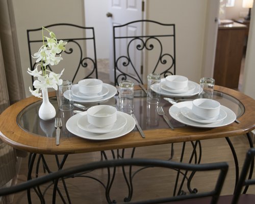 A glass top dining table.