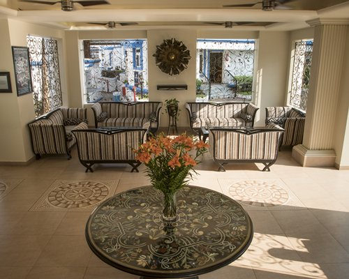 A well furnished lounge area of Karma Royal Palms resort.
