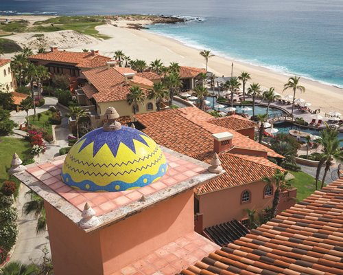 An aerial view of the resort alongside the ocean.