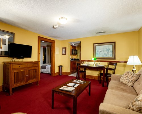 A well furnished hallway with a vanity.