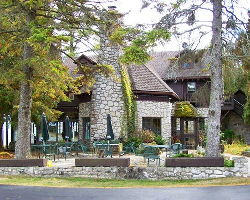 A street view of patio furniture alongside the Glidden Lodge Beach Resort.