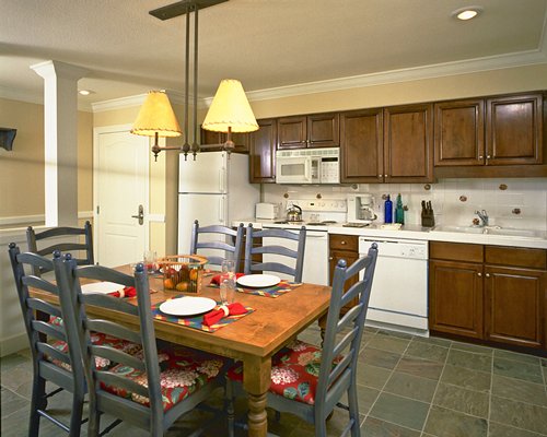 An open plan kitchen with a dining area.