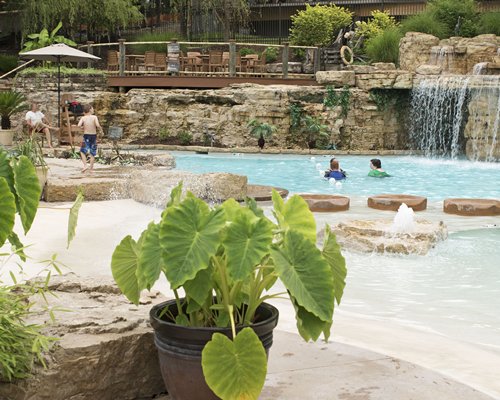 A view of an outdoor grotto pool.
