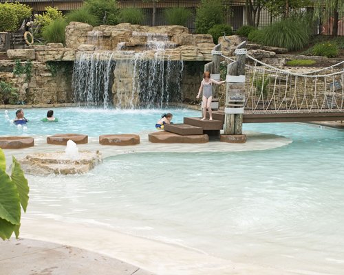 A view of an outdoor grotto pool.