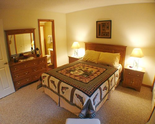 A well furnished bedroom with a dresser.
