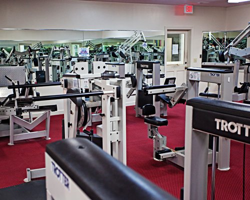 An indoor fitness area with exercise equipment.