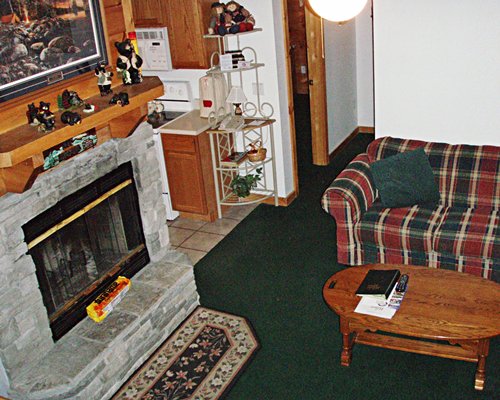 A well furnished living room with a fireplace.