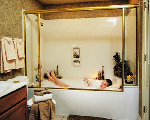 A woman bathing in a bathtub.