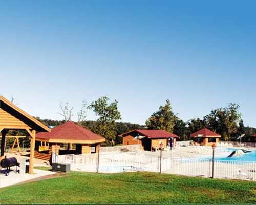 View of units with an outdoor swimming pool.
