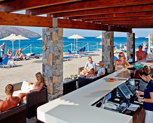 Outdoor restaurant alongside the beach.