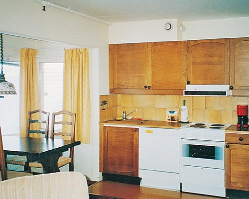 An open plan kitchen and dining area.