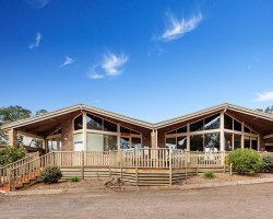 AN EXTERIOR VIEW OF THE BELLBRAE COUNTRY CLUB.