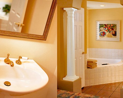 A bathroom with a bathtub and single sink.