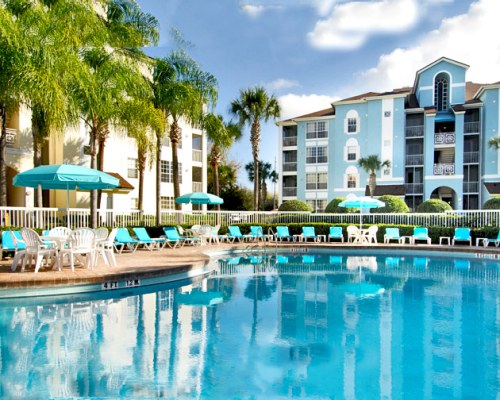 Serene outdoor swimming pool close to multiple units.