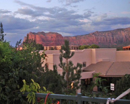 Balcony view of a resort unit with the mountain.