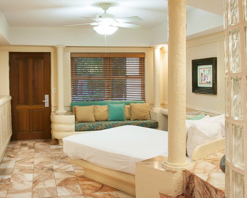 An open plan bedroom and living room.
