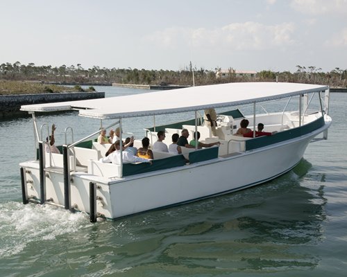 A group of tourists sailing on a boat.