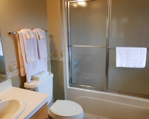 A bathroom with single sink vanity.