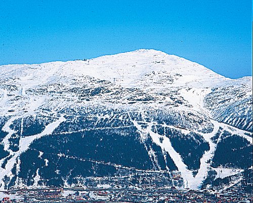 A view of mountains covered with snow.