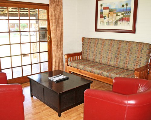A well furnished living room with outside view.