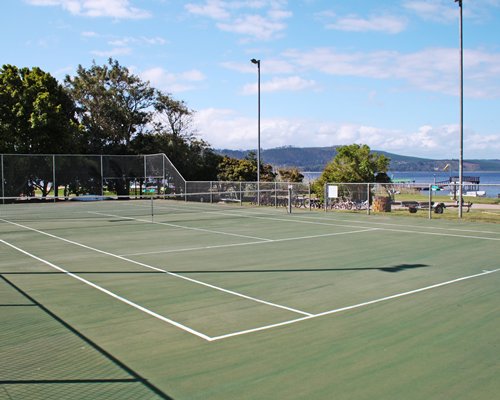 An outdoor tennis court.
