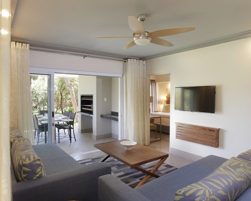 A well furnished bedroom with two beds.