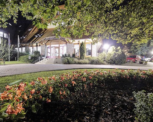 Scenic pathway leading to the resort at night.