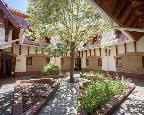 Scenic pathway and entrance to multiple units at Club Dobogomajor.