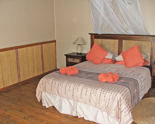 A well furnished bedroom with queen bed.