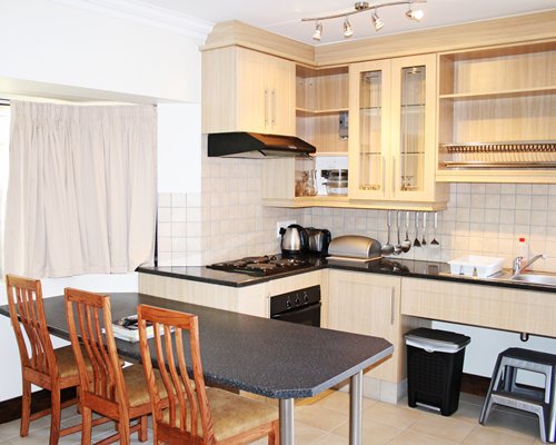 An open plan kitchen and dining area.
