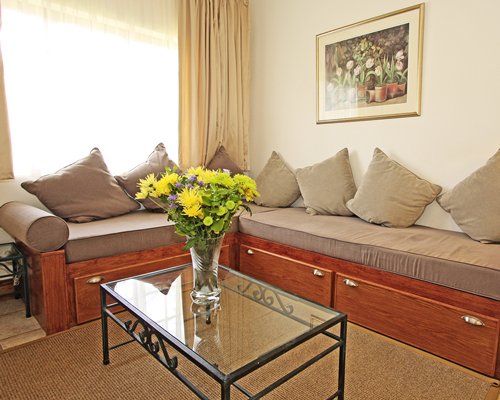 A well furnished living room with outside view.