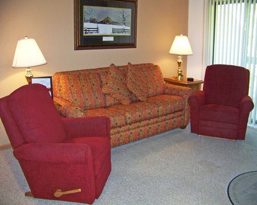 A well furnished living room with sofas.