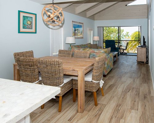 A well furnished living room with a balcony.