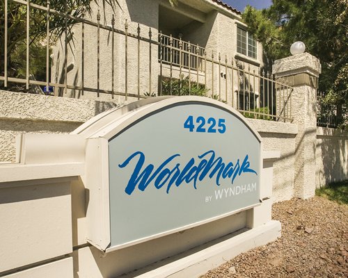Scenic exterior view of WorldMark Las Vegas with a signboard.