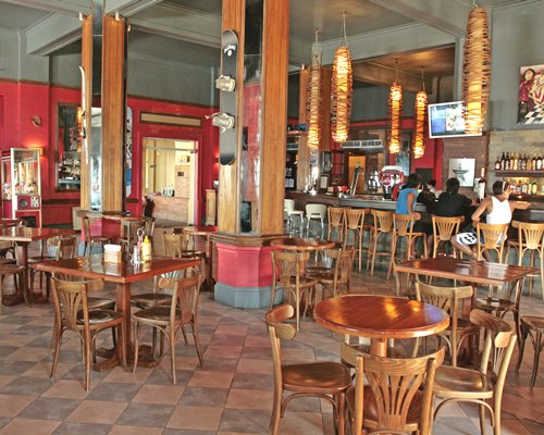 Indoor bar with restaurant at Gran Hotel Pucon.