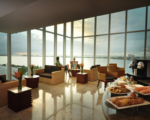 A spacious lounge with waterfront view.