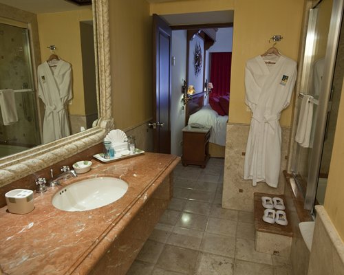A bathroom with a single sink vanity.
