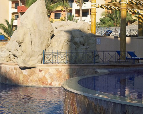 An exterior view of an outdoor pool.