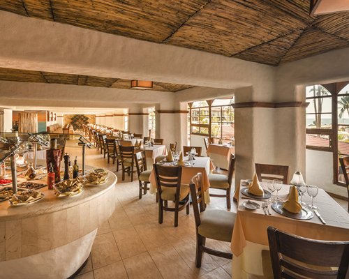 A fine dining restaurant with an outside view.