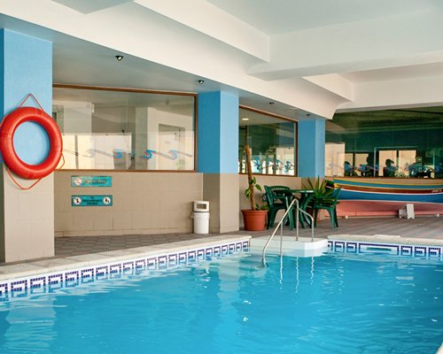 Indoor swimming pool at Porto Azzurro Resort Club.