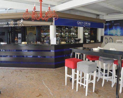 An indoor bar at the Porto Azzurro Resort Club.