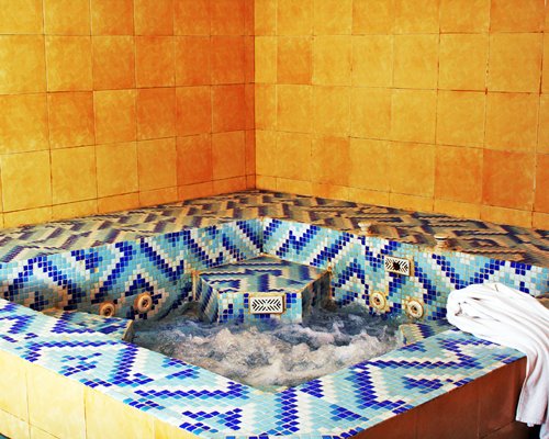 Indoor hot tub at Country Inn Bhimtal.