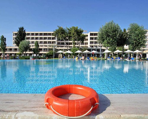 Porto Heli Resort's large outdoor swimming pool.