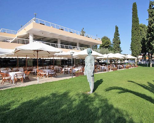 A statue alongside a restaurant.
